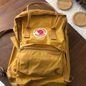 Yellow water resistant backpack .